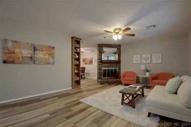 1 of 2 living spaces. This one has a woodburning/gas starter fireplace.