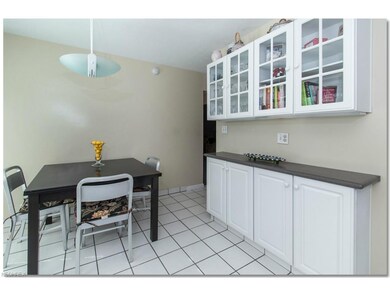 Eat-in Kitchen with Beautiful White Cabinets, Unde
