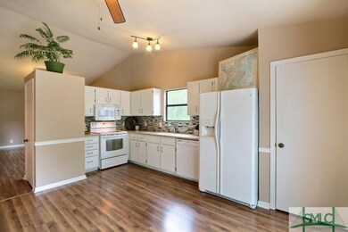 Kitchen with vaulted ceiling, new light fixture, w