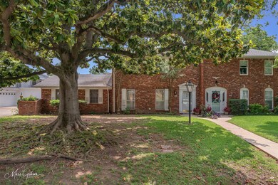 View of front of home featuring a front lawn