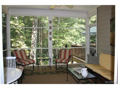Screened porch joins deck, nature awaits you in yo