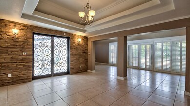 ELEGANT STACKED STONE & IRON DOORS