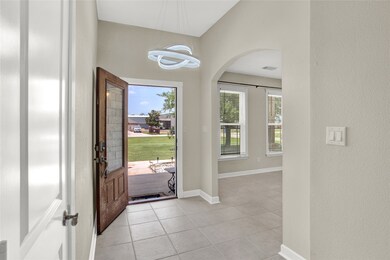 View from the hallway viewing the front door and f