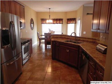 THIS KITCHEN HAS TONS OF COUNTER SPACE, BREAKFAST 