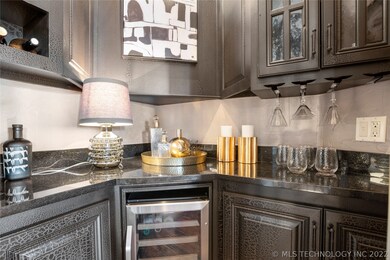 Custom finished cabinetry, granite counters, wine