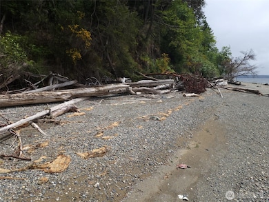 Pea gravel beach at the top. Sand at the bottom of the beach.