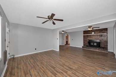 Laminate flooring, fresh paint, ceiling fan, fireplace, ceiling fan