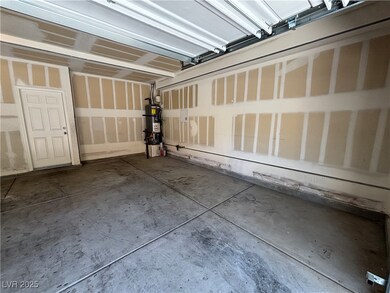 Garage with strapped water heater