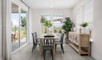 Dining area with sliding door to the covered patio
