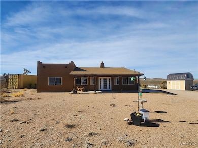 Front of the property showing the Conex and Tuff s
