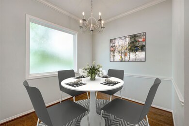 Breakfast room with large picture window. The wind