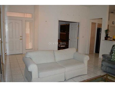 Property Photo. Entrance and Den with door
