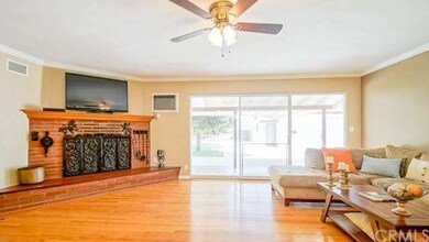 Living room is enhanced by the  Beautiful Wood flo