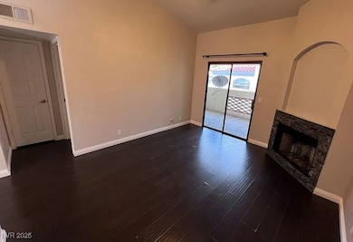 Unfurnished living room featuring a fireplace and