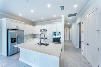 Kitchen - Stainless Steel Whirlpool appliances.