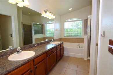 Master Bathroom with dual sinks, garden tub & Walk