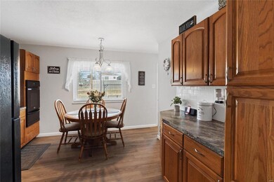 Kitchen entry from living room.  Back door and mai
