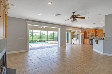 Family room with fireplace opens up completely to 