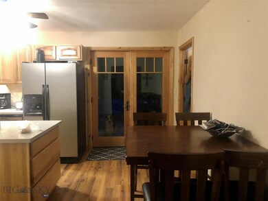 Patio doors to back patio, hot tub and gazebo.