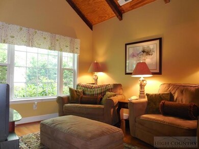 Den/Flex space has wonderful windows bringing the outside in