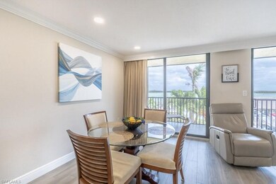 Dining room with crown molding, a wealth of natura