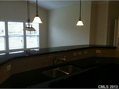 Kitchen - Upscale granite breakfast bar will seat 
