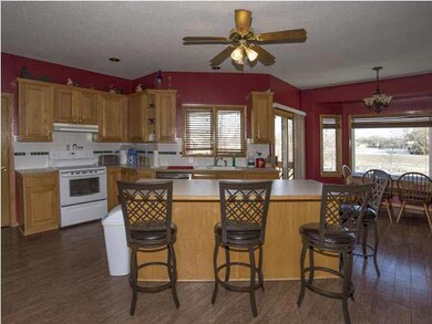 Open kitchen featuring island/eating bar and lots 