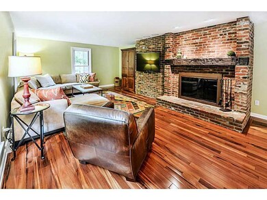 Den/Family/Great Room. One of Three Cozy Log Burni