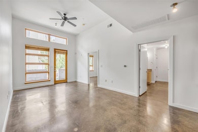 Foyer entrance with concrete flooring, a wealth o