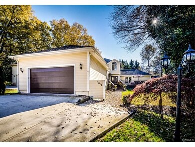 Extra pad for parking on two car garage.