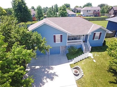 1703 Longhorn Ln, Raymore, MO 64083 - photo 2