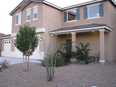 Covered front patio at entry
