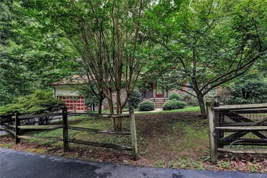 Partially fenced yard, lots of space for gardening
