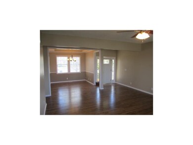 Beautiful dark walnut refinished floors, with form