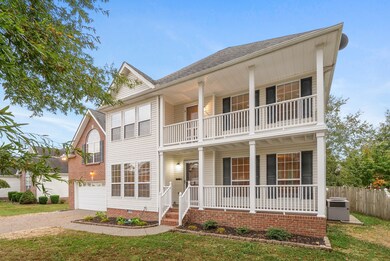Downstairs porch big enough for table and chairs. Upstairs porch coming off the Master suite.