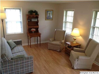 Living room with new laminate hardwood, lots of na