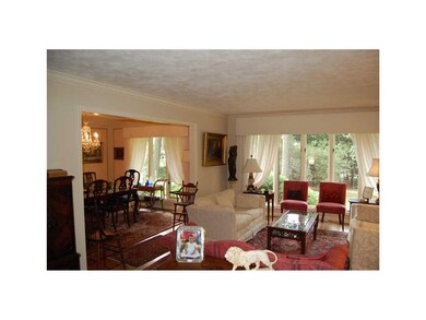 Living Room. The formal dining room is adjacent to