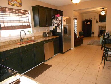 Kitchen. Kitchen Leading into Den/Family Room. Fea