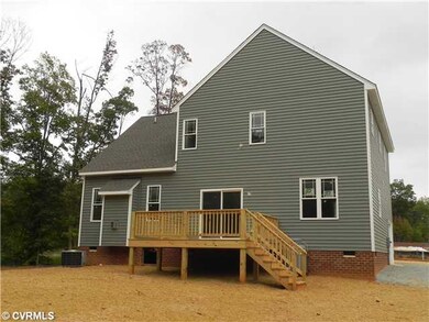 Exterior Back - Deck overlooking large, private ba