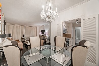 The dining room opens up to the living are which i