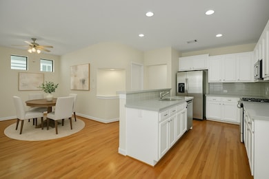 Virtually Staged dining room - Bright kitchen with