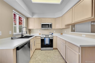 The updated kitchen features new stove, oven, microwave and more