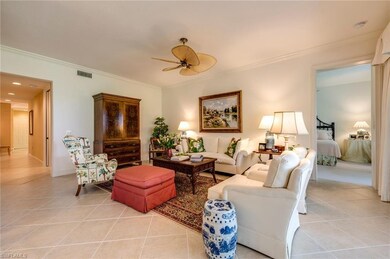 Living room with entrance to master bedroom on the