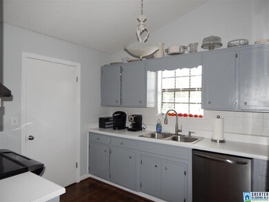 Updated kitchen with beautiful hardwood floors and