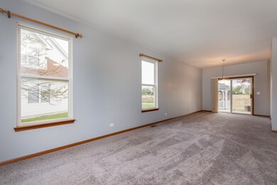 Living Room looking into the Dining Room.  9 foot 