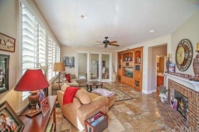 Light & Bright Family Room Appointed with Wood Shu