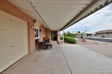 covered porch leading to security door