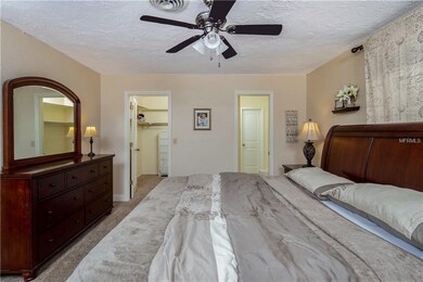 The master bedroom has a large walk-in closet, sun