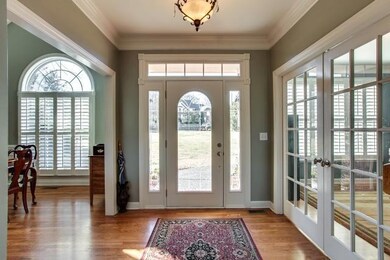 Glistinening hardwoods throughout - invite the visitor into the home.