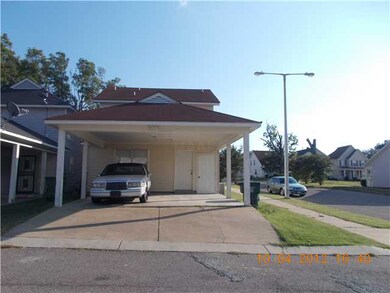 2 Carport located in the rear of property.